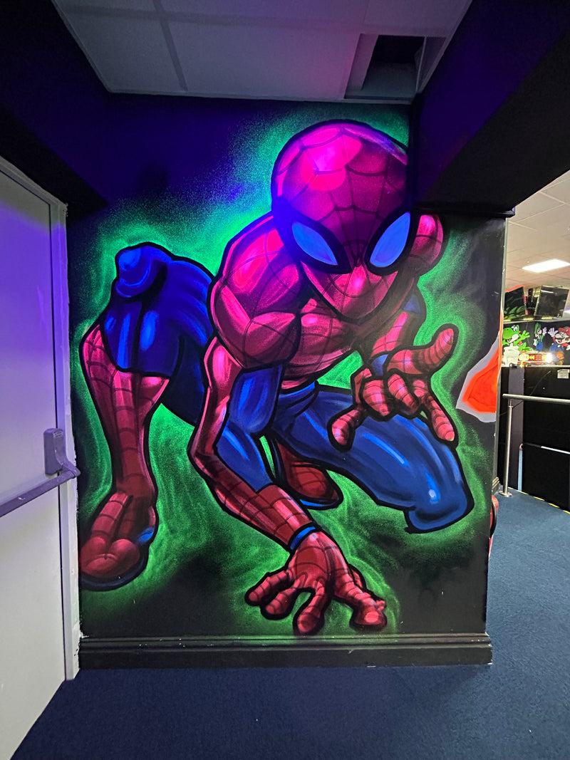 Colorful superhero artwork on a blackboard with vibrant colors.