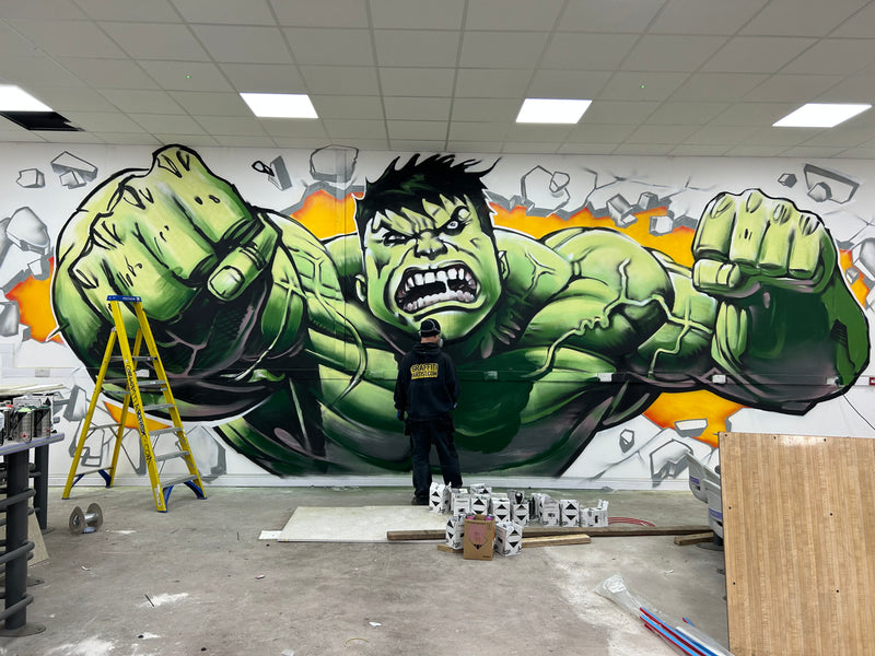 Mural of the Hulk in a room with construction elements